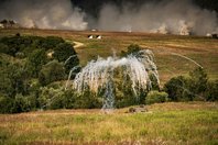 Schüsse, Explosionen und riesige graue Staubwolken - ein realistisches Bild eines Schlachtfeldes. (Foto: Bundesheer/Rainer Zisser)