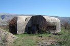 Maschinengewehr-Bunker in Form eines Dreiviertelkreises in der Nordost-Ecke. (Foto: Manuel Martinovic)